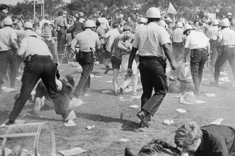 A photo of police clearing protestors out of Grant Park during the Democratic Convention in Chicago in 1968. Original source: Philadelphia Inquirer, www.inquirer.com/opinion/commentary/chicago-democratic-convention-1968-memories-20240818.html.
